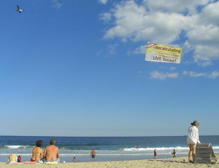 Tow Banner Announcing Live Recalculating Shows
